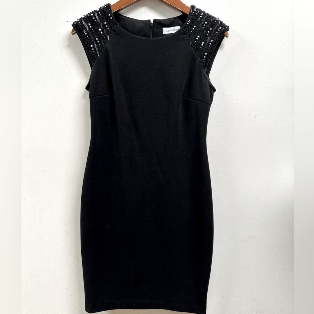 Calvin Klein black ponte dress with embellished cap sleeves; size 2.